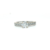 18ct - 0.44ct centre stone- Diamond shoulders channel set 0.31ct- 0.75tcw