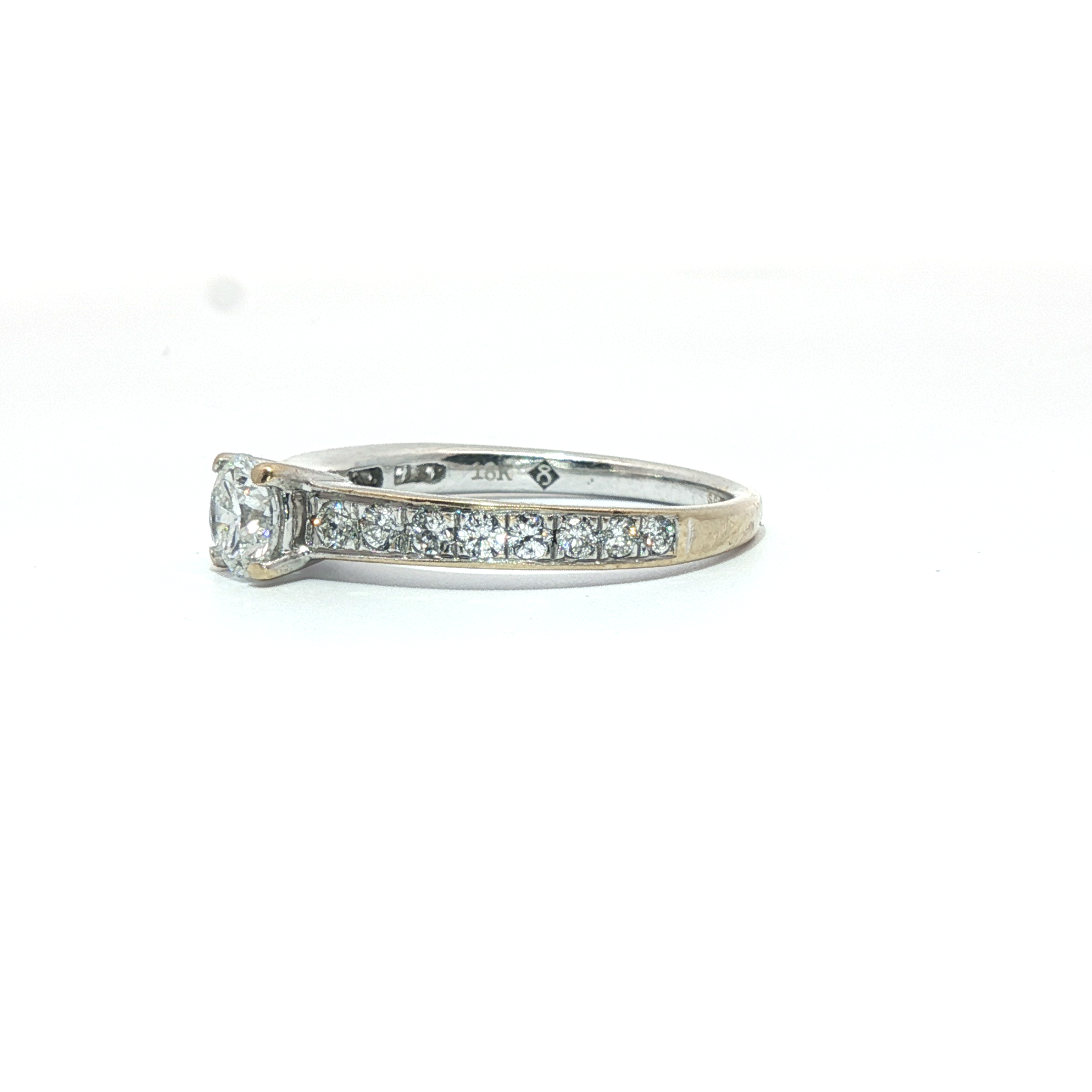 18ct - 0.44ct centre stone- Diamond shoulders channel set 0.31ct- 0.75tcw - Goldbank Jewellers